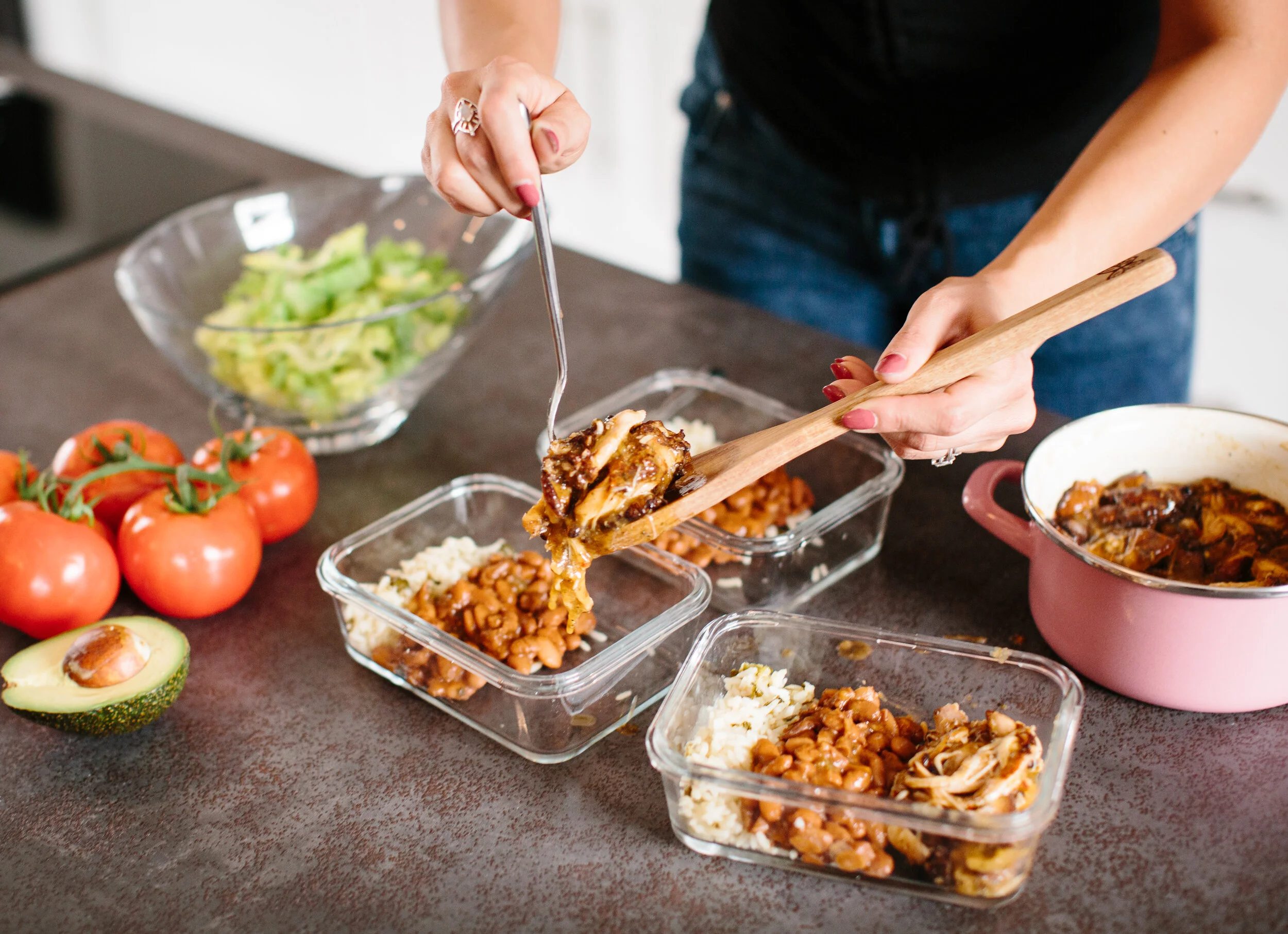 Various meal prep containers stacked and organized